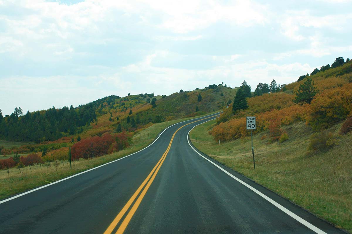 Winding road through the hills of Western Massachusetts in early autumn