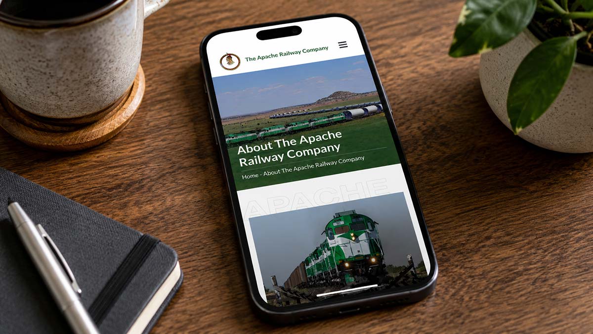 Mobile phone mockup of the new apache railway website
