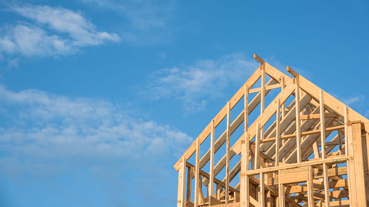 Roof framing under construction showing how a strong foundation supports effective roofing marketing
