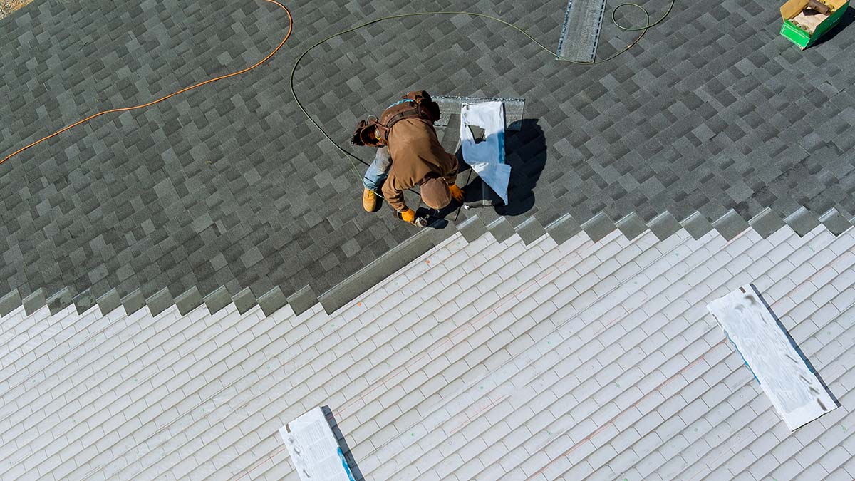 Overhead view of a roofing project demonstrating the importance of strategic roofing marketing for contractors